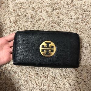 Black and gold Tory Burch zipper wallet